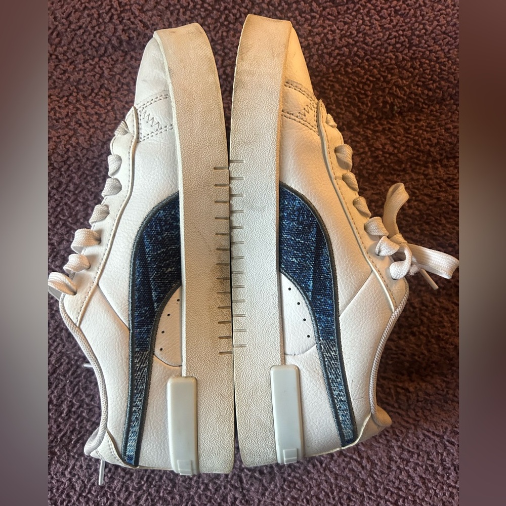 Denim and white pumas tennis shoes